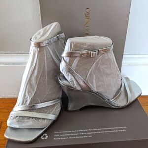 Silver sculpted wedge heels by Franco Sarto